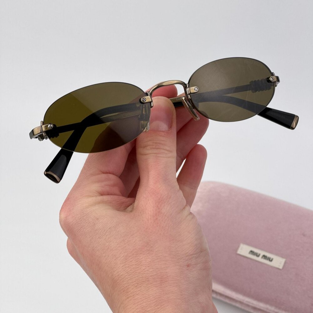 Miu Miu Women’s Oval Sunglasses – Old Gold Brown Model MUA54S 26C09Z AUTHENTIC
